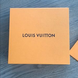 Louis Vuitton box and gift bag.